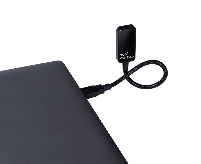 Tobii Dynavox EyeR plugged into laptop