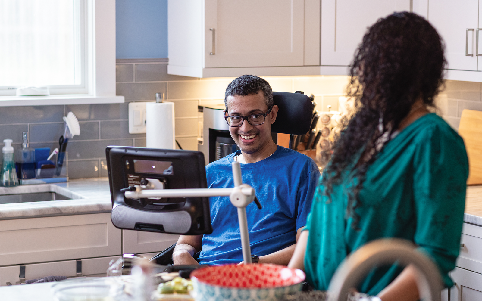 Alistair in the kitchen with his family